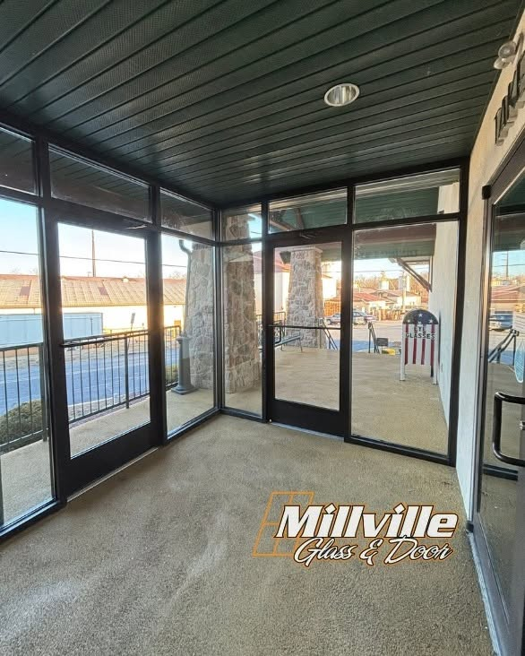 Commercial glass storefront installation by Millville Glass and Door